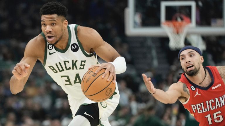 Milwaukee Bucks' Giannis Antetokounmpo gets past New Orleans Pelicans' Jose Alvarado during the first half of an NBA basketball game Sunday, Jan. 29, 2023, in Milwaukee. (Morry Gash/AP)