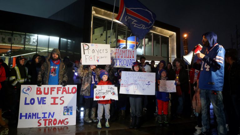 Buffalo Bills fans attend a candlelight prayer vigil for player Damar Hamlin at Highmark Stadium on January 3, 2023 in Orchard Park, New York. Hamlin collapsed after making a tackle last night on Monday Night Football. (Photo by Timothy T Ludwig/Getty Images)