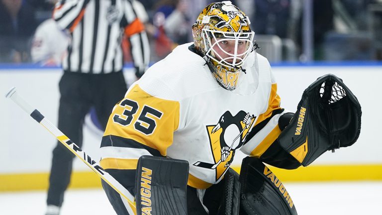 Pittsburgh Penguins goaltender Tristan Jarry protects his net during the second period of an NHL hockey game against the New York Islanders, Tuesday, Dec. 27, 2022, in Elmont, N.Y. (Frank Franklin II/AP)