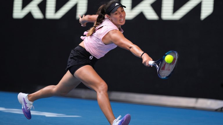 Jessica Pegula of the U.S. plays a backhand return to Barbora Krejcikova of the Czech Republic during their fourth round match at the Australian Open tennis championship in Melbourne, Australia, Sunday, Jan. 22, 2023. (Ng Han Guan/AP)