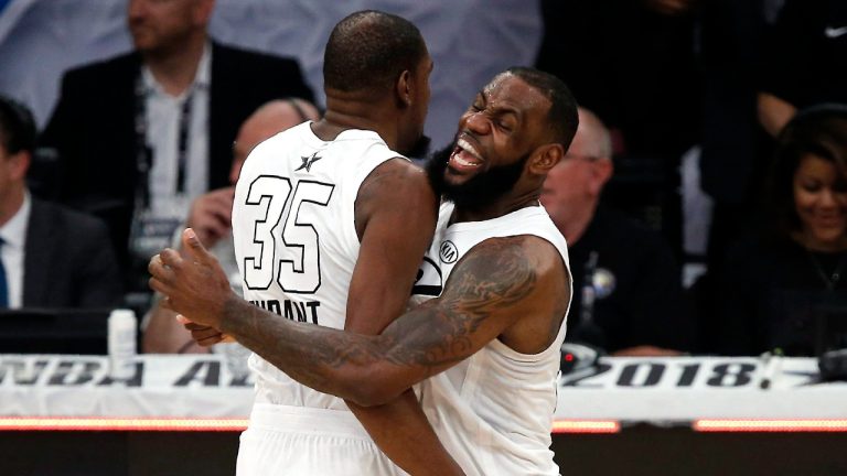 Kevin Durant, left, celebrates with LeBron James during the second half of an NBA All-Star basketball game. (Alex Gallardo/AP)