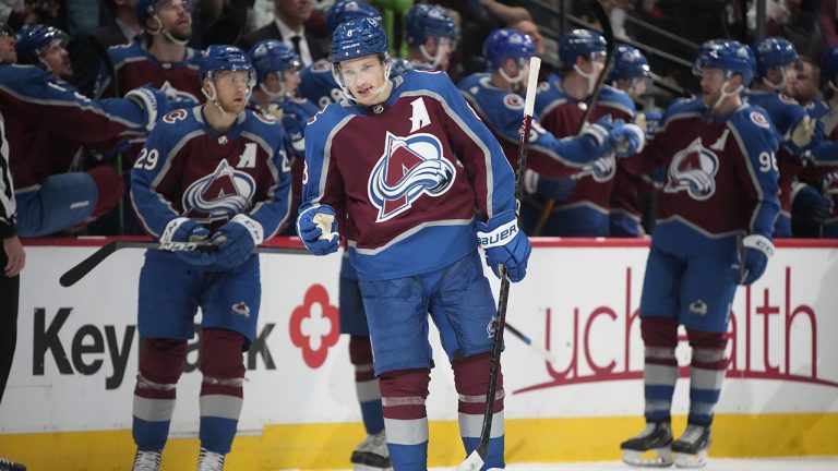 Colorado Avalanche defenceman Cale Makar, centre, gestures after scoring a goal against the Detroit Red Wings in the second period of an NHL hockey game Monday, Jan. 16, 2023, in Denver. (David Zalubowski/AP)