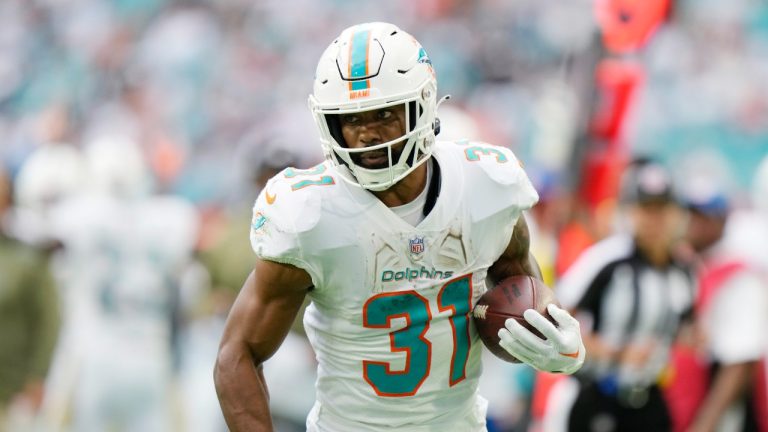 Miami Dolphins running back Raheem Mostert (31) runs for a touchdown during the second half of an NFL football game against the Cleveland Browns, Sunday, Nov. 13, 2022, in Miami Gardens, Fla. (Wilfredo Lee/AP Photo)