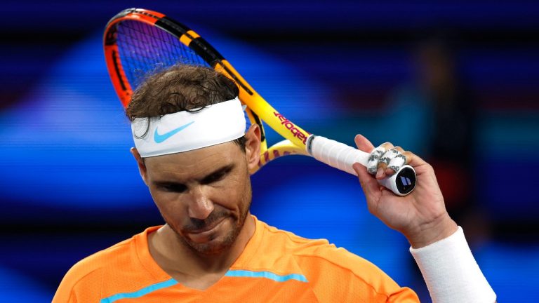 Rafael Nadal of Spain reacts during his second round match against Mackenzie McDonald of the U.S., at the Australian Open tennis championship in Melbourne, Australia, Wednesday, Jan. 18, 2023. (AP)