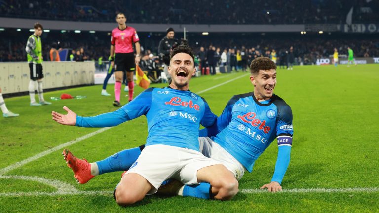 Napoli's Giovanni Di Lorenzo, right, and Eljif Elmas celebrate during the Serie A soccer match between SSC Napoli and Juventus FC at the Diego Armando Maradona stadium in Naples, Italy, Friday, Jan. 13, 2023. (Alessandro Garofalo/LaPresse via AP)