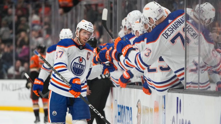 Edmonton Oilers' Connor McDavid (97) is congratulated for his goal during the first period of the team's NHL hockey game against the Anaheim Ducks. (Jae C. Hong/AP)