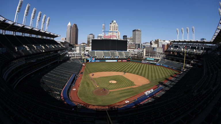 Workers finish installing the Cleveland Guardians sign above the scoreboard at Progressive Field, Thursday, March 17, 2022, in Cleveland. (Ron Schwane/AP)