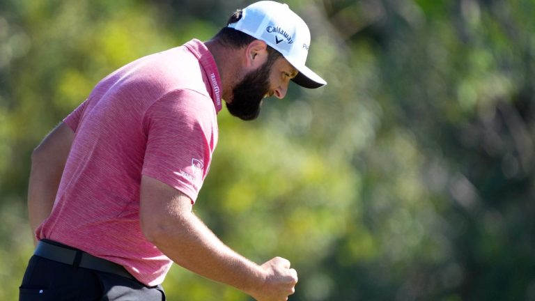 Jon Rahm, of Spain, celebrates his birdie putt on the 18th green during the final round of the Tournament of Champions golf event, Sunday, Jan. 8, 2023, at Kapalua Plantation Course in Kapalua, Hawaii. (Matt York/AP Photo)