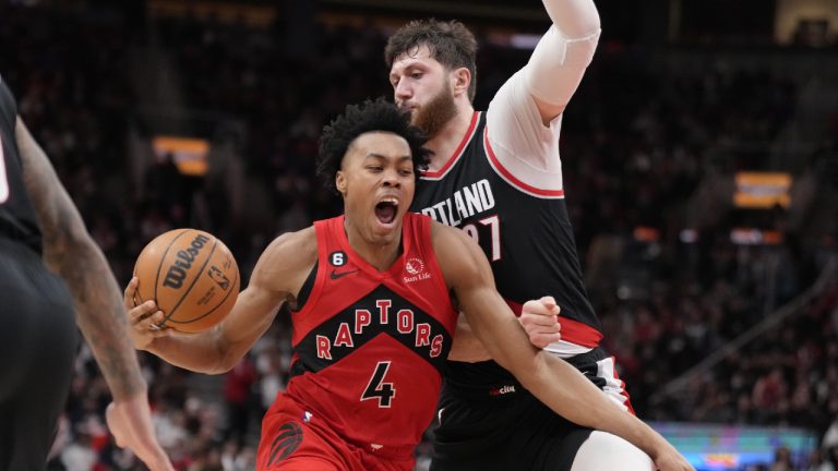 Toronto Raptors forward Scottie Barnes (4) drives for the basket as Portland Trail Blazers centre Jusuf Nurkic (27) defends during second half NBA basketball action in Toronto on Sunday, Jan. 8, 2023. (Frank Gunn/CP)