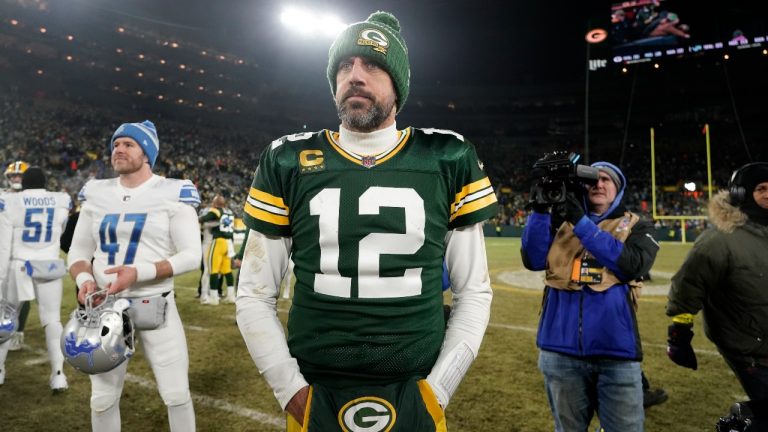 Green Bay Packers quarterback Aaron Rodgers stands on the field following an NFL football game against the Detroit Lions Sunday, Jan. 8, 2023, in Green Bay, Wis. The Lions won 20-16. (Morry Gash/AP Photo)