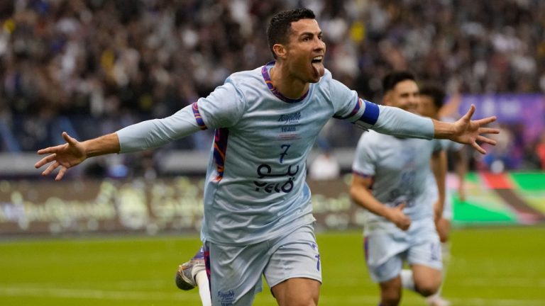 Cristiano Ronaldo celebrates after scoring his side's second goal playing for a combined XI of Saudi Arabian teams Al Nassr and PSG during a friendly soccer match, at the King Saud University Stadium, in Riyadh, Saudi Arabia, Thursday, Jan. 19, 2023. (Hussein Malla/AP)