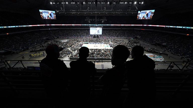 Fans watch the first half of an NBA basketball game between the San Antonio Spurs and the Golden State Warriors in San Antonio, Friday, Jan. 13, 2023. The game was played at the Alamodome in an effort to set a new single-game attendance record for an NBA game. (Eric Gay/AP)