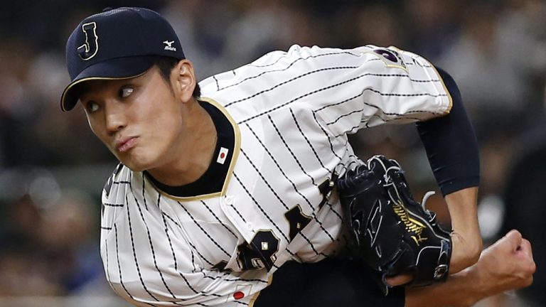 Japan's pitcher Shintaro Fujinami pitches against China during the fourth inning of their first round game of the World Baseball Classic at Tokyo Dome in Tokyo, Friday, March 10, 2017. (Toru Takahashi/AP)