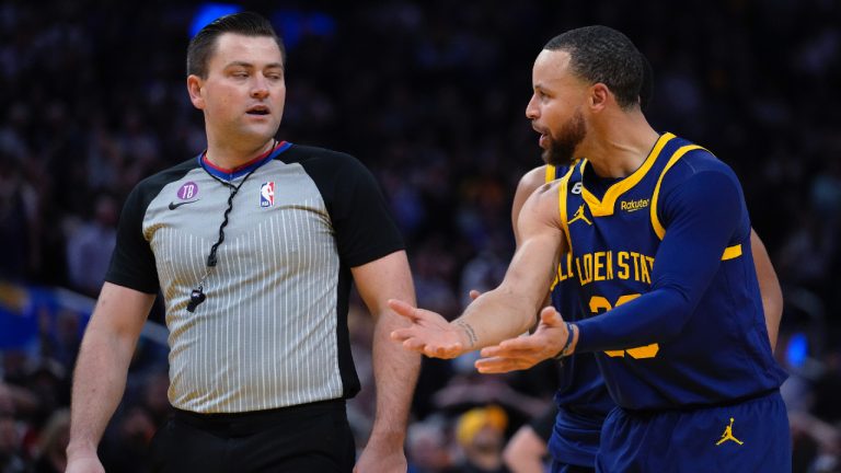 Golden State Warriors guard Stephen Curry, right, reacts after being charged with a technical foul during the second half of the team's NBA basketball game against the Memphis Grizzlies in San Francisco, Wednesday, Jan. 25, 2023. Curry was ejected. (Godofredo A. Vásquez/AP)