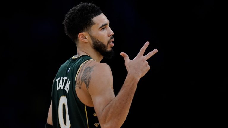 Boston Celtics' Jayson Tatum (0) celebrates his three-point basket during first half of an NBA basketball game against the Los Angeles Lakers Tuesday, Dec. 13, 2022, in Los Angeles. (Jae C. Hong/AP Photo)