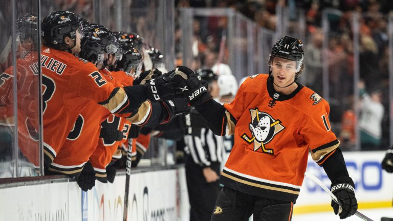 Anaheim Ducks centre Trevor Zegras (11) is congratulated for his goal against the Seattle Kraken during the third period of an NHL hockey game in Anaheim, Calif., Wednesday, Oct. 12, 2022. (Kyusung Gong/AP)