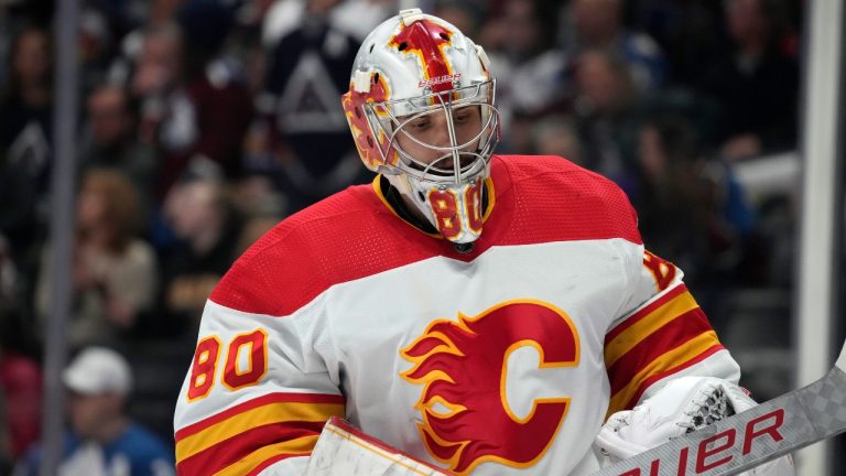 Calgary Flames goaltender Dan Vladar prepares for action in the first period of an NHL hockey game against the Colorado Avalanche. (David Zalubowski/AP)