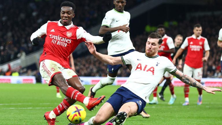 Eddie Nketiah of Arsenal is challenged by Pierre-Emile Hojbjerg of Tottenham Hotspur during the Premier League match between Tottenham Hotspur and Arsenal FC at Tottenham Hotspur Stadium on January 15, 2023 in London, United Kingdom. (Chris Brunskill/Fantasista/Getty Images)