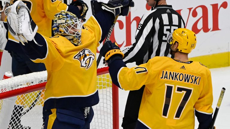 Nashville Predators goaltender Yaroslav Askarov (30) celebrates with center Mark Jankowski (17) after their win over the Florida Panthers in an NHL preseason hockey game. (Mark Zaleski/AP)