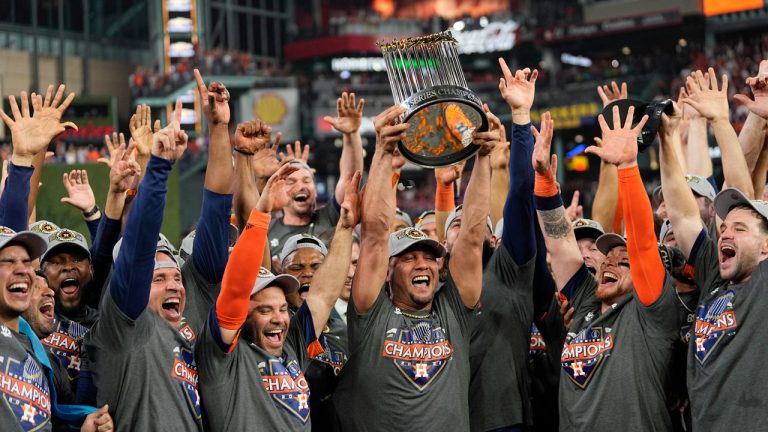 The Houston Astros celebrate their 4-1 World Series win against the Philadelphia Phillies.  (David J. Phillip/AP)