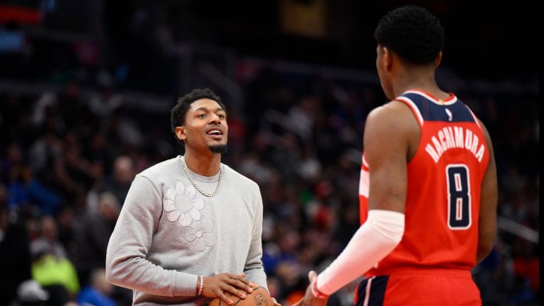 Washington Wizards guard Bradley Beal, left, handles a basketball next to teammate forward Rui Hachimura (8) during a break in the action in the second half of an NBA basketball game against the New York Knicks, Friday, Jan. 13, 2023, in Washington. Beal is out with an injury. (Nick Wass/AP)