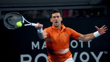 Novak Djokovic shrugs off injury scare, wins Adelaide title