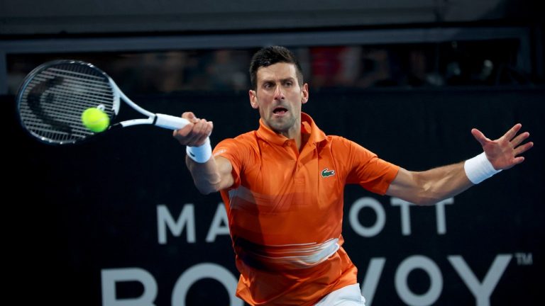 Serbia's Novak Djokovic makes a forehand return to USA's Sebastian Korda during the final of the Adelaide International tennis tournament in Adelaide, Australia, Sunday, Jan. 8, 2023. (Kelly Barnes/AP)