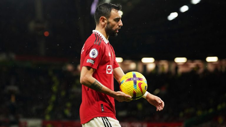 Manchester United's Bruno Fernandes holds the ball during the English Premier League soccer match between Manchester United and Bournemouth at Old Trafford in Manchester, England, Tuesday, Jan. 3, 2023. (AP)