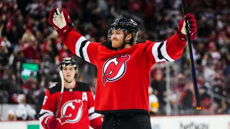 New Jersey Devils' Dougie Hamilton celebrates after scoring the game-winning goal during the overtime period of an NHL hockey game, Sunday, Jan. 22, 2023, in Newark, N.J. The Devils won 2-1. (Frank Franklin II/AP)