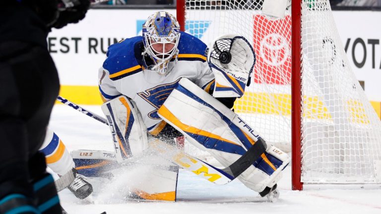 St. Louis Blues goaltender Joel Hofer catches the puck during the first period of the team's NHL hockey game against the San Jose Sharks on Thursday, Nov. 4, 2021, in San Jose, Calif. (Josie Lepe/AP)