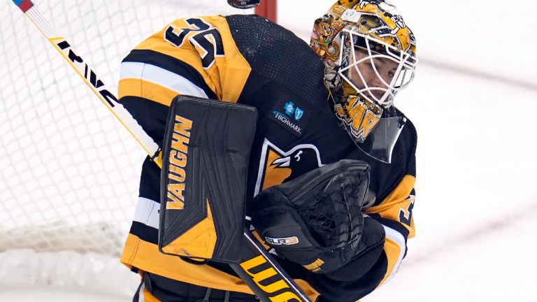 Pittsburgh Penguins goaltender Tristan Jarry blocks a shot during the first period of the team's NHL hockey game against the New Jersey Devils in Pittsburgh, Friday, Dec. 30, 2022. (Gene J. Puskar/AP)