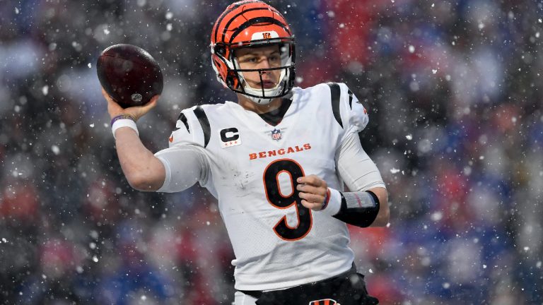 Cincinnati Bengals quarterback Joe Burrow (9) passes against the Buffalo Bills during the third quarter of an NFL division round football game, Sunday, Jan. 22, 2023, in Orchard Park, N.Y. (Adrian Kraus/AP)