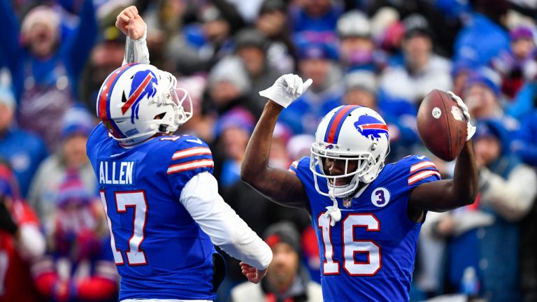 Buffalo Bills wide receiver John Brown (16) celebrates his touchdown with quarterback Josh Allen (17) during the second half of an NFL football game against the New England Patriots. (Adrian Kraus/AP)