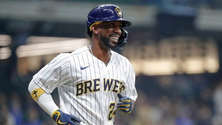 Milwaukee Brewers designated hitter Andrew McCutchen reacts after walking against the Miami Marlins during the sixth inning of a baseball game Saturday, Oct. 1, 2022, in Milwaukee. (Jon Durr/AP Photo)