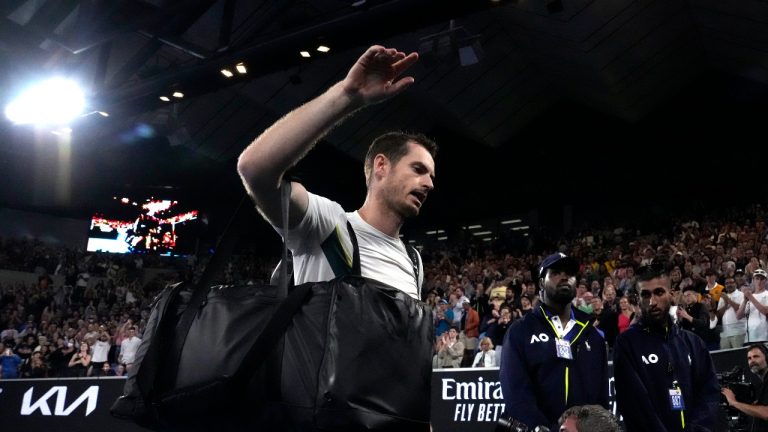 Andy Murray of Britain waves as he leaves Margaret Court Arena following his third round loss to Roberto Bautista Agut of Spain at the Australian Open tennis championship in Melbourne, Australia, Saturday, Jan. 21, 2023. (Ng Han Guan/AP Photo)