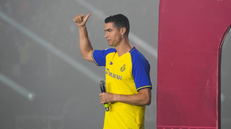 Cristiano Ronaldo reacts during his official unveiling as a new member of Al Nassr soccer club in in Riyadh, Saudi Arabia, Tuesday, Jan. 3, 2023.Ronaldo, who has won five Ballon d'Ors awards for the best soccer player in the world and five Champions League titles, will play outside of Europe for the first time in his storied career. (Amr Nabil/AP)