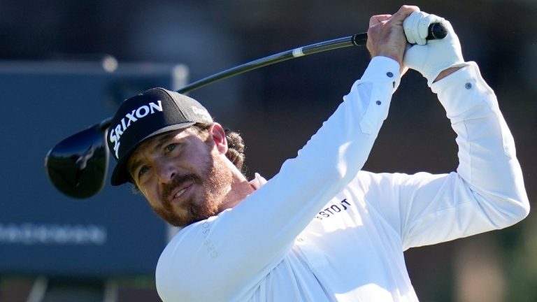 Sam Ryder watches his tee shot on the 14th hole of the South Course at Torrey Pines during the second round of the Farmers Insurance Open golf tournament Thursday, Jan. 26, 2023, in San Diego. (Gregory Bull/AP)