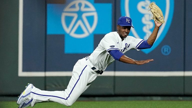 Kansas City Royals center fielder Michael A. Taylor catches a fly ball for the out on Minnesota Twins' Gary Sanchez during the third inning of a baseball game Tuesday, Sept. 20, 2022, in Kansas City, Mo. (Charlie Riedel/AP)