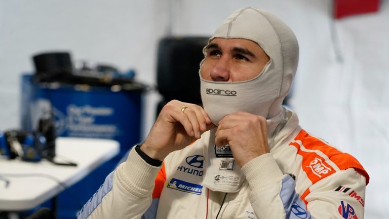 Robert Wickens in his pit stall, prepares to go out on the track during practice for the Rolex 24 hour auto race at Daytona International Speedway, Thursday, Jan. 27, 2022, in Daytona Beach, Fla. (John Raoux/AP)