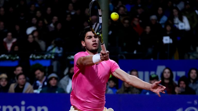 Carlos Alcaraz of Spain returns the ball to Dusan Lajovic of Serbia during an Argentina Open ATP quarterfinals match, in Buenos Aires, Argentina, Friday, Feb. 17, 2023. (Natacha Pisarenko/AP)