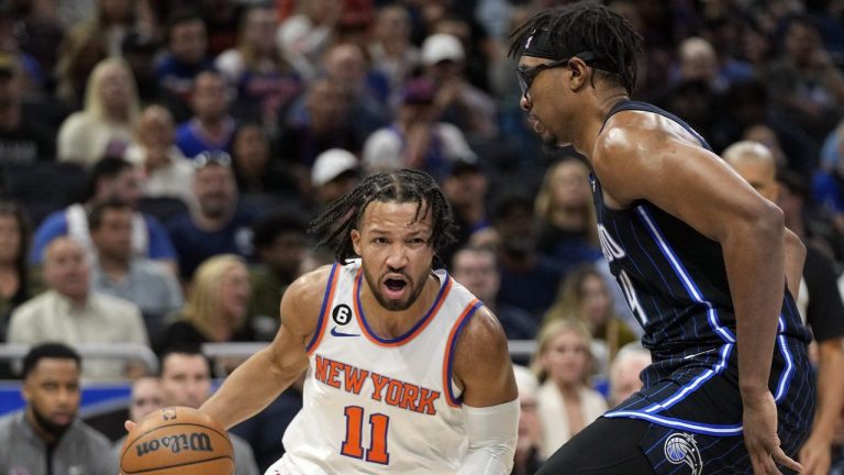 New York Knicks' Jalen Brunson (11) drives around Orlando Magic's Wendell Carter Jr. during the first half of an NBA basketball game Tuesday, Feb. 7, 2023, in Orlando, Fla. (John Raoux/AP)