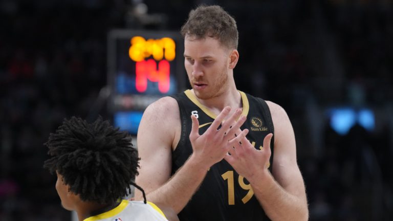 Toronto Raptors Jakob Poeltl (reacts) as he's called for a foul on Utah Jazz guard Collin Sexton during first half NBA basketball action in Toronto on Friday, February 10, 2023. (Chris Young/CP)