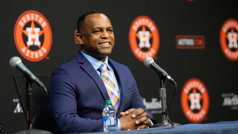 Dana Brown smiles during a news conference after being hired as the Houston Astros general manager. (David J. Phillip/AP)