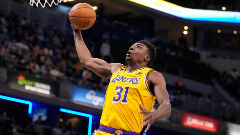 Los Angeles Lakers center Thomas Bryant (31) goes up for a dunk against the Indiana Pacers during the first half of an NBA basketball game in Indianapolis, Thursday, Feb. 2, 2023. (AP Photo/Michael Conroy)