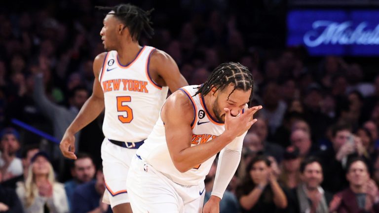 New York Knicks guard Jalen Brunson gestures after making a three point shot against the Brooklyn Nets as New York Knicks guard Immanuel Quickley (5) watches during the first half of an NBA basketball game. (Jessie Alcheh/AP)