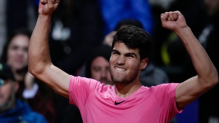 Carlos Alcaraz of Spain celebrates after defeating Dusan Lajovic of Serbia at the end of their Argentina Open ATP quarterfinals match, in Buenos Aires, Argentina, Friday, Feb. 17, 2023. (AP Photo/Natacha Pisarenko)