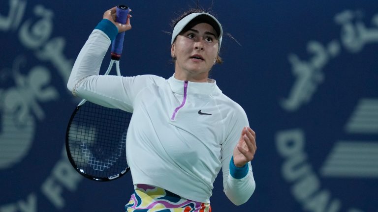 Canada's Bianca Andreescu returns the ball to Kazakhstan's Elena Rybakina during a match of the Dubai Duty Free Tennis Championships in Dubai. (Kamran Jebreili/AP)