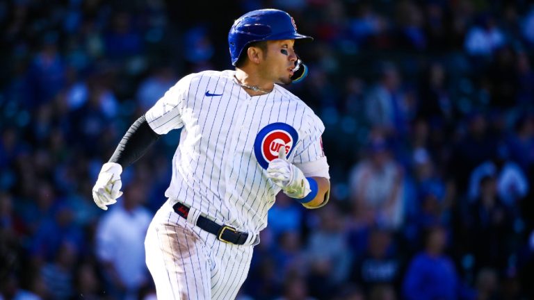 Chicago Cubs' Seiya Suzuki runs the bases after hitting a home run against the Cincinnati Reds during the seventh inning of a baseball game, in Chicago, Saturday, Oct. 1, 2022. (Matt Marton/AP)