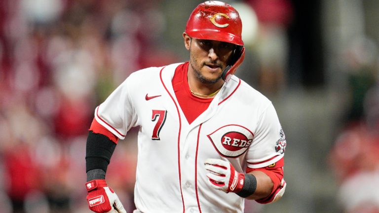 Cincinnati Reds' Donovan Solano runs the bases after hitting a solo home run during the eighth inning of the team's baseball game against the Boston Red Sox on Wednesday, Sept. 21, 2022, in Cincinnati. (Jeff Dean/AP)