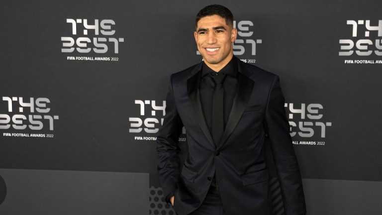 Moroccan player Achraf Hakimi poses on the green carpet before the ceremony of the Best FIFA Football Awards in Paris, France, Monday, Feb. 27, 2023. (Michel Euler/AP)